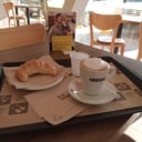 Foto de Café cortado + 1 medialuna (cód 7211)