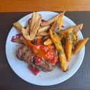 Foto de RIBS DE CERDO AL DISCO CON PAPAS Y BATATAS RUSTICAS