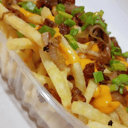 Foto de Papas fritas c/cheddar