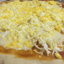 Foto de Muzza con huevo rallado