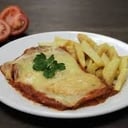 Foto de Suprema de pollo napolitana con fritas