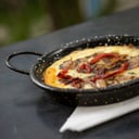 Foto de Provoleta con hongos y tomates asados