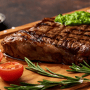 Foto de 1/2 bife de chorizo a la parrilla con guarnición a elección