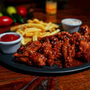 Foto de Alitas BBQ Picantes.