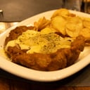 Foto de  Milanesa Ojo de Bife c/ Guarniciòn