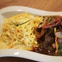 Foto de FETTUCCINE EN SALSA A LA HUANCAÍNA CON LOMO SALTADO