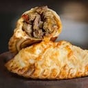 Foto de Duo de empandas cortadas al cuchillo