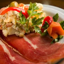 Foto de Jamòn Crudo con ensalada Rusa