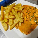 Foto de Saltado de Camarones (12 unid) Guarnición a escoger.