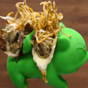 Foto de Taco de pollo asado con queso, guacamole casero y cebolla frita (2 unds.)