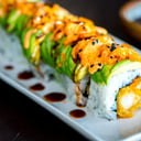 Foto de Dragon roll (anguila, aguate, salsa especial)