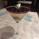 Foto de Cheesecake con frutos rojos o dulce de membrillo 