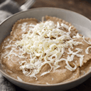 Foto de TORTELLINIS DE QUESO DE CABRA EN SALSA DE TRUFA Y QUESO DE CABRA