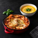 Foto de Lasaña + crema/sopa + bebida