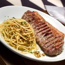 Foto de Bife de costilla con espagheti gratinado