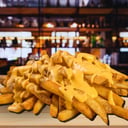 Foto de Papas Fritas con cheddar