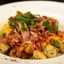 Foto de Patatine formaggio e pancetta