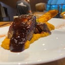 Foto de Bondiola braseada con BBQ