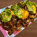 Foto de Nachos  de chili con carne, guacamole casero, crema ágria y queso cheddar fundido 