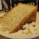 Foto de Porción de Torta de naranja con semillas de amapola