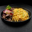 Foto de Lomo Saltado con Fetuccini a la Huancaína