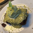 Foto de Brownie de chocolate Dubài con helado de pistacho