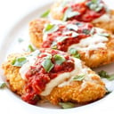 Foto de MILANESA A LA PARMESANA DE POLLO