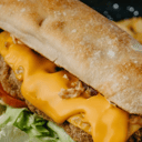 Foto de Milanesa de carne, jamón, muzarella, panceta.