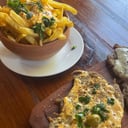 Foto de Milanesa con cheddar + guarnición