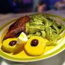 Foto de Tallarines Verdes con bondiola y papas a la huancaina