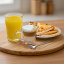 Foto de Combo 4: Café con leche + Exprimido + Tostado de jamón y queso