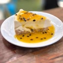 Foto de Porción Cheescake de Maracuyá