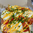 Foto de PIZANESA PARA 3 TAREA FINA (tomate, jamon, muzza, huevo, cheddar y cebolla de verdeo)