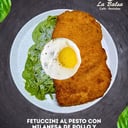 Foto de Fetuccini al pesto con milanesa de pollo y huevo a la inglesa