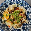 Foto de Dumplings de Cerdo con Chili Oil 