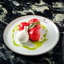 Foto de Burrata con tomates marinados