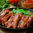 Foto de COSTILLAS  A LA PARRILLA 2X1 