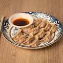Foto de Gyozas de cerdo y cebolla hervidas